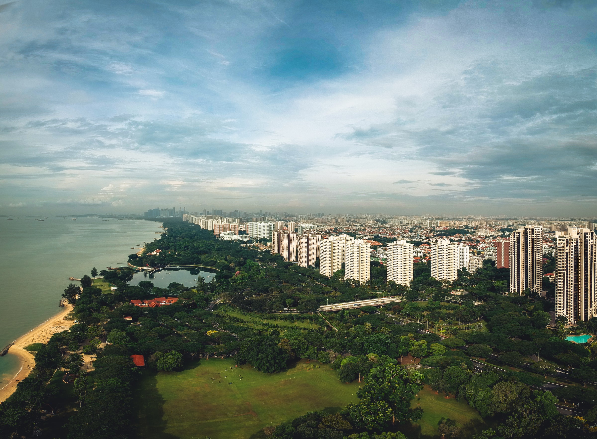 Aerial view showcasing Singapore's natural spaces and residential properties