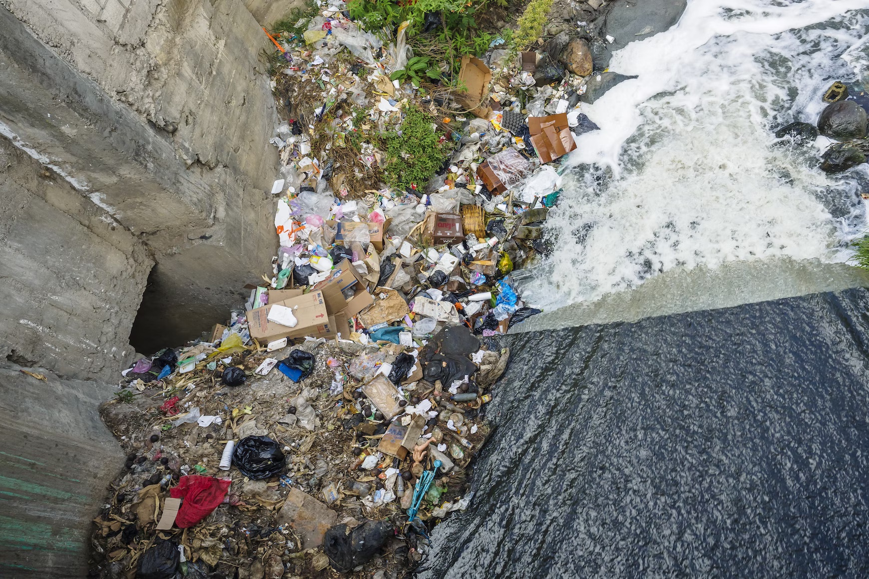 Global waste crisis, landfill filled with trash